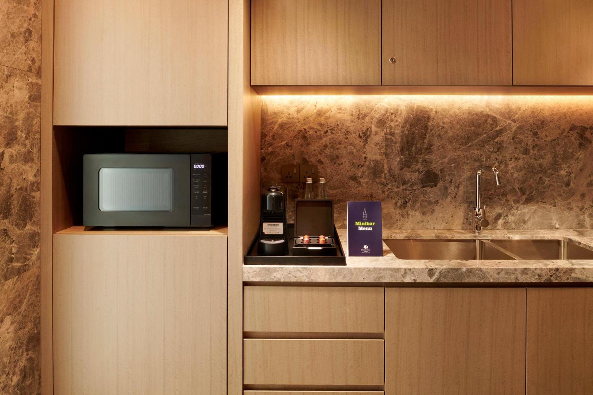 Doubletree By Hilton Shah Alam I-City Exterior photo A microwave oven in a kitchen
